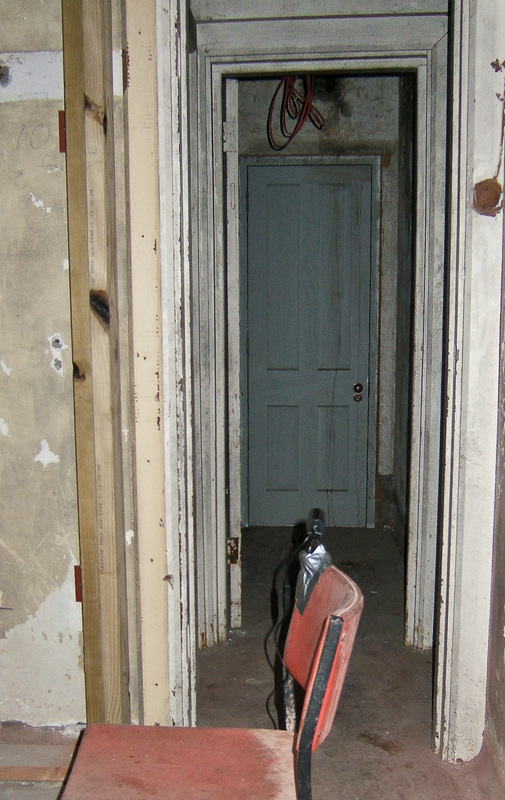 Slamming door, with DV camera in position, ground floor of Nurses’ Home, 2010. Photo: James Gilberd, Wellington Fever Hospital
