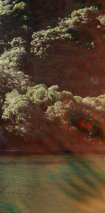 Evil Eye or just lens flare?, detail of demon face photo, Milford Sound new Zealand, Strange Occurrences paranormal investigators