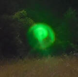 green lens flare orb from cellphone camera, paranormal  false positive, New Zealand Strange Occurrences Society, photo by Faith Frederick  